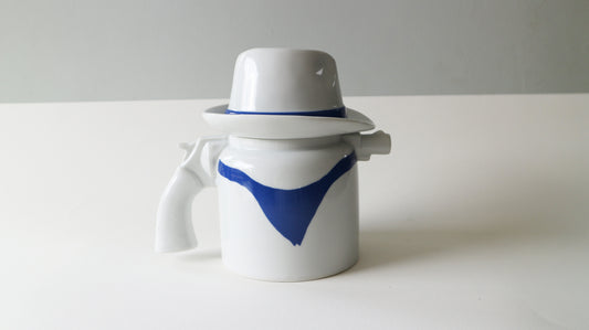 VINTAGE Cowboy-shaped teapot in white ceramic
